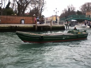 A workboat on the way to fetch the accursed third bag of luggage.