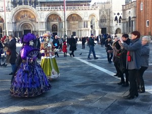 Elaborately costumed characters march around in pairs all over Venice, not just in Piazza San Marco.